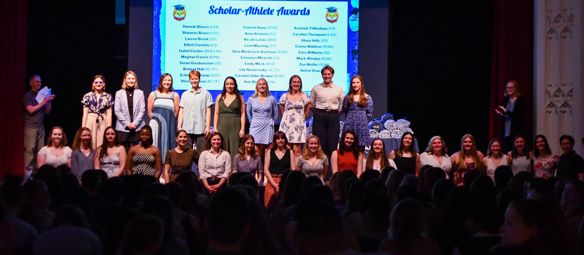 The Mount Holyoke Class of 2024 Scholar-Athlete award winners are cheered by the audience at the annual athletics awards in Chapin Auditorium on April 28, 2024. (Bob Blanchard/RJB Sports)