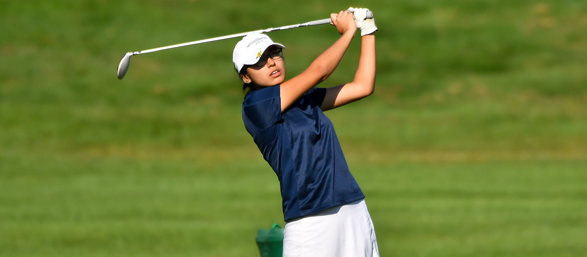 Action photo of Lyons golfer, Lahela Delaney.