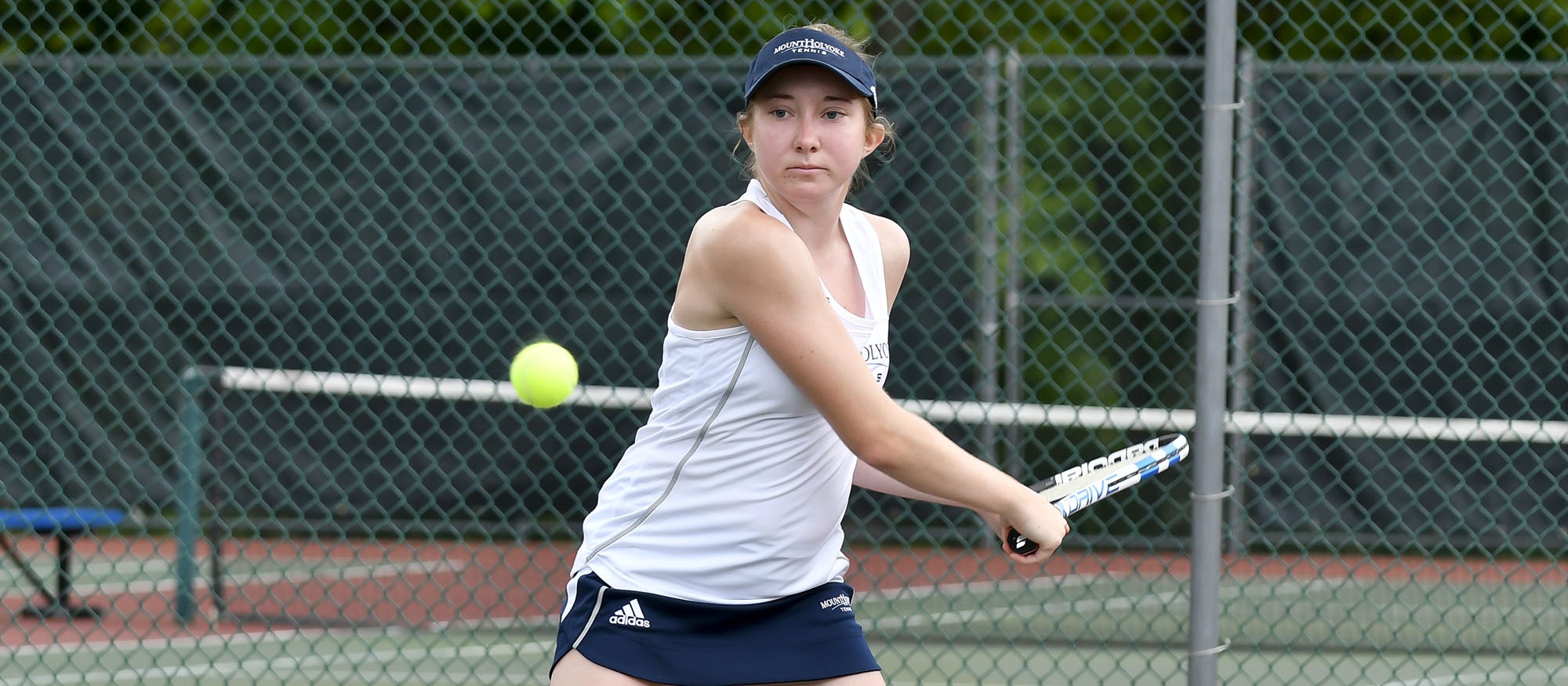 Action photo of Lyons tennis player Katherine Schumacher