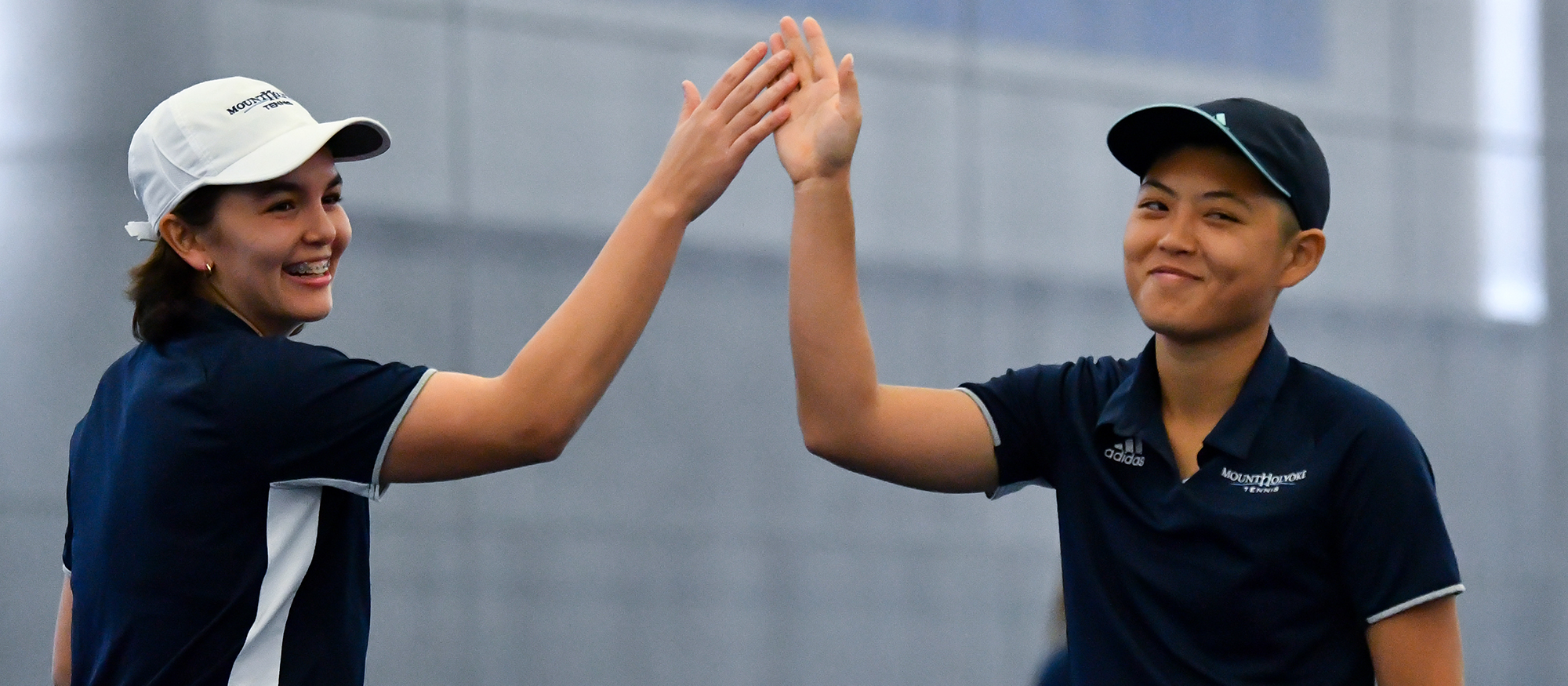 Tennis Blanks Simmons in Season Opener, 9-0