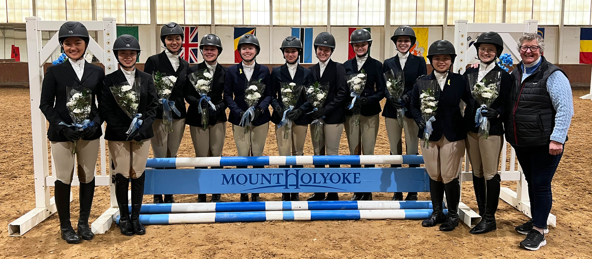 The Class of 2025 poses during Senior Day recognition at the Mount Holyoke Show on March 1, 2025. (Andrea Ricketts-Preston)