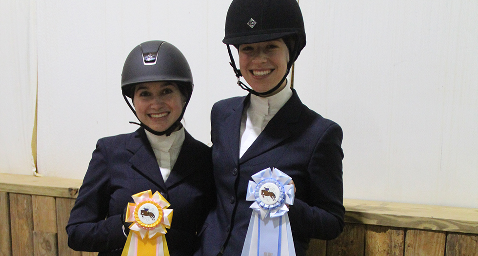 Mollie Kowalchik (left) & Franny Eremeeva (right) display their medalist ribbons.