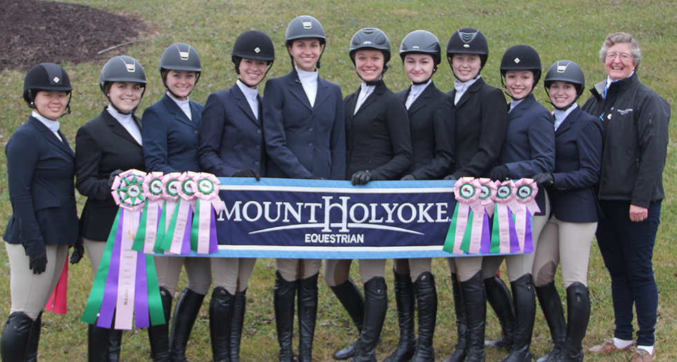 The Lyons and head coach C.J. Law following a fifth-place finish at the Winter 1 Tournament of Champions event.