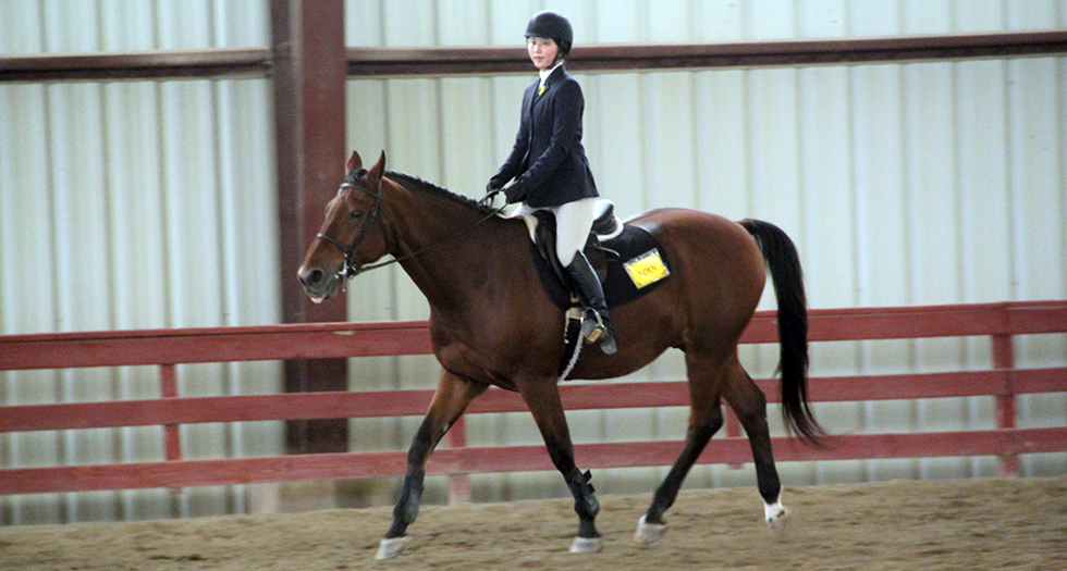 Photo of MHC sophomore Honami Tanaka during her blue ribbon ride at Preseason Tournament of Champions.
