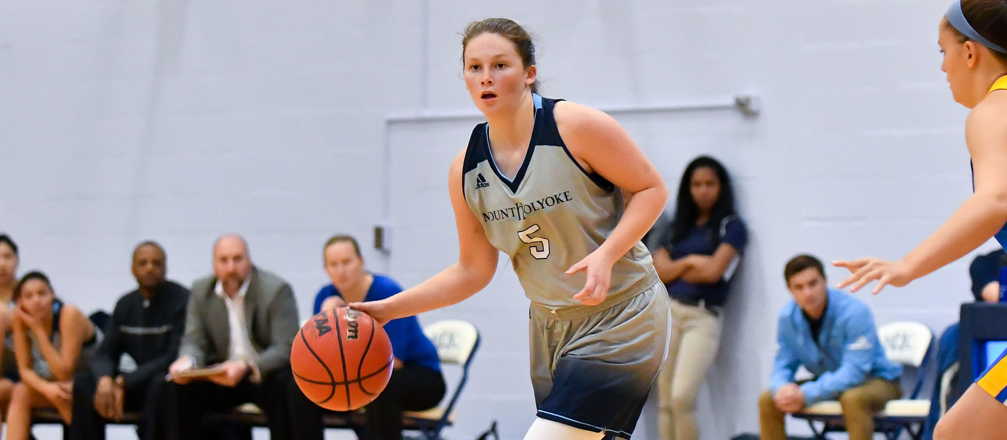 Action photo of Lyons sophomore basketball player, Katlyn Grover.