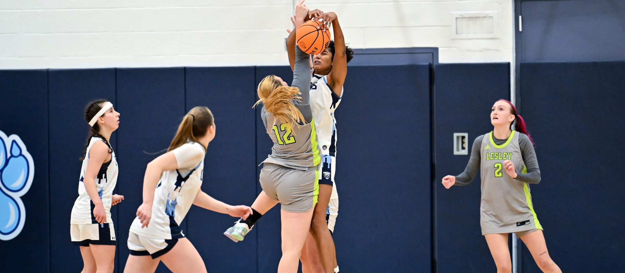 Sofia Francisco blocks Lesley's Alawnah Dundah on the final shot of the game, preserving the Lyons' 45-43 win on Nov. 25, 2025. (Bob Blanchard RJB Sports)