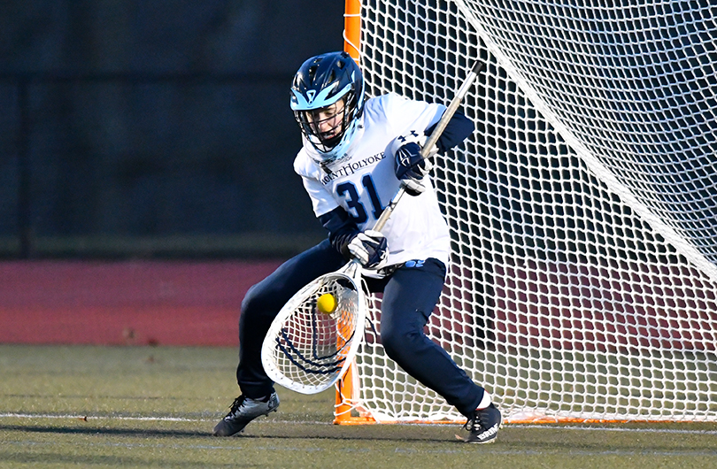 Action photo of Lyons lacrosse goalie, Sophia Brooks-Randall.