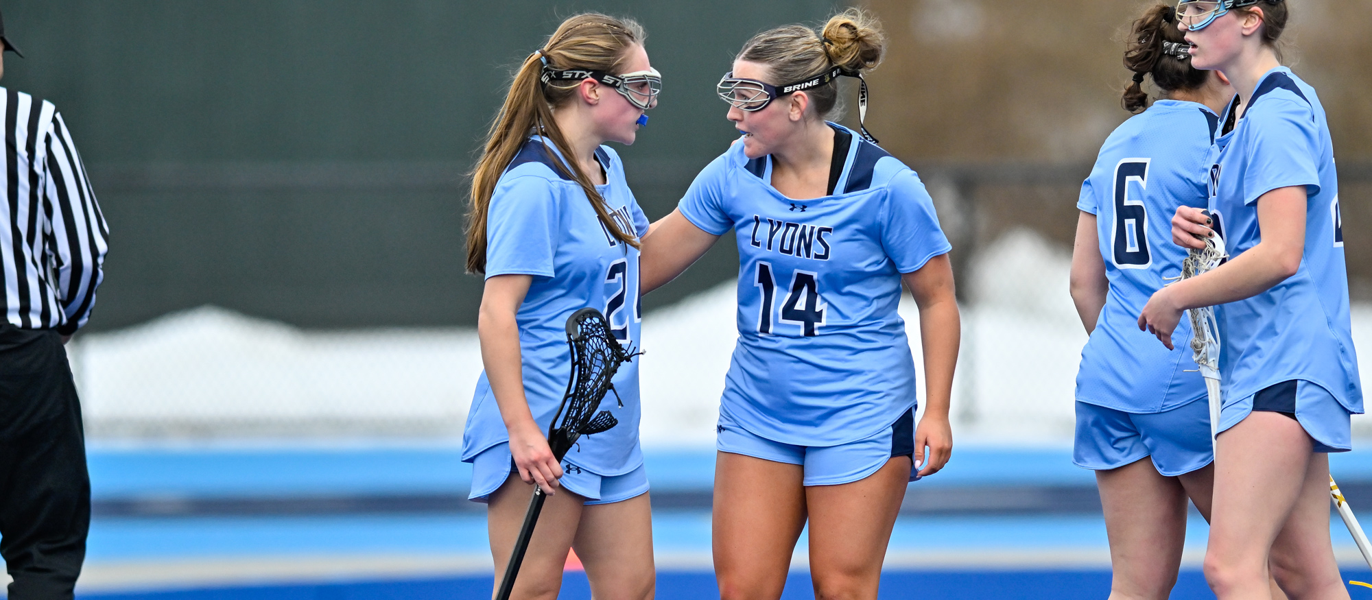 Emi Bisson (14) broke Mount Holyoke single-game assists and points records, and Juliana Spaulding (24) tied the Lyons' single-game goals record in a 19-18 win at Emerson on March 22, 2025. (RJB Sports file photo)