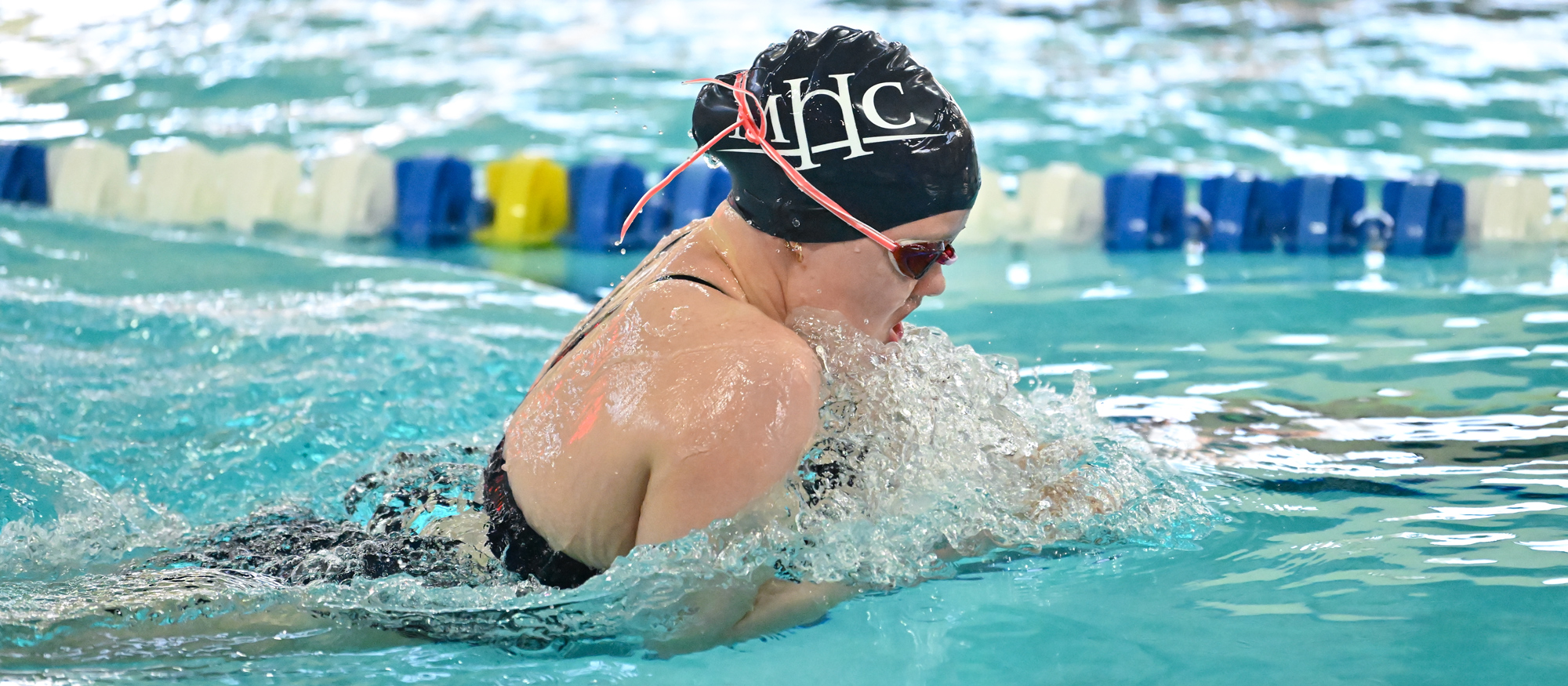 Swimming and diving outscores Clark while splitting dual meets at Wheaton