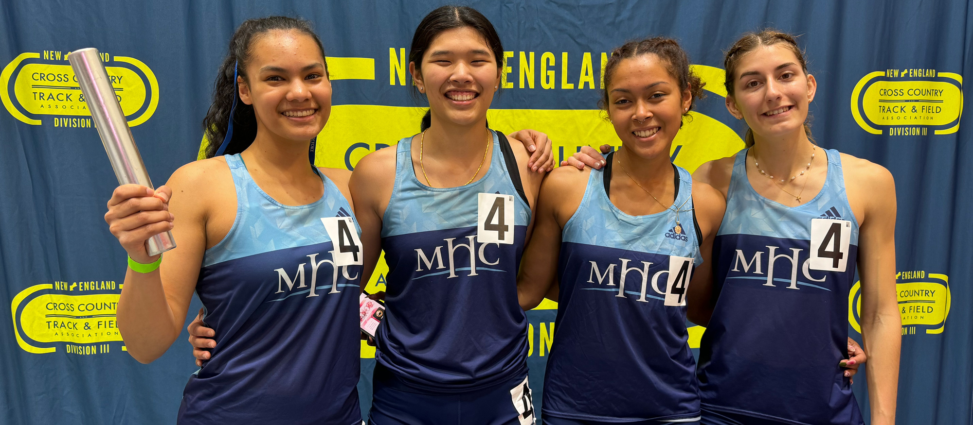 From left to right, Aria Mallare, Elle Rimando, Sachi Robinson and Ioanna Tsoni broke Mount Holyoke's 4x200 relay record on Feb. 28, 2025 at the New England Division III Indoor Championships in Boston.