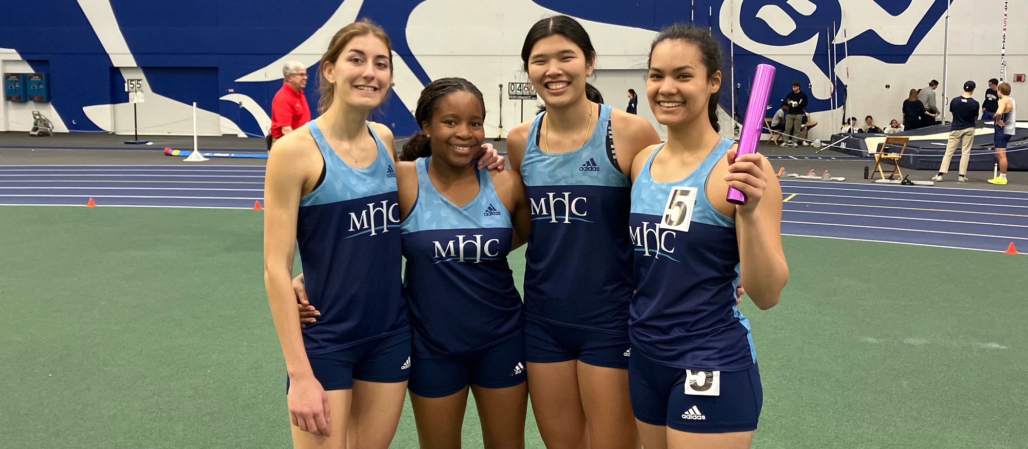 From left to right, Ioanna Tsoni, Zivaishe Jaravaza, Elle Rimando, and Aria Mallare ran Mount Holyoke's fourth-fastest 4x200 relay ever on Feb. 8, 2025 at the Middlebury Field and Track Meet.