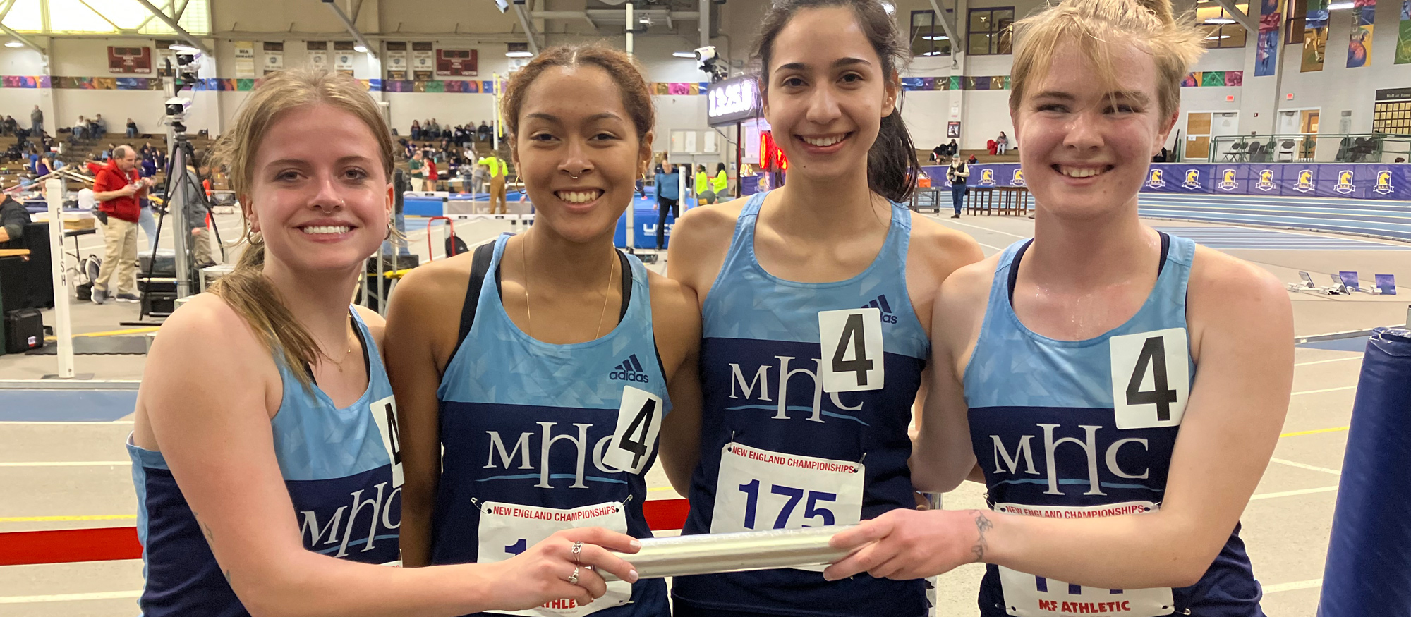 Setting Mount Holyoke's school record in the distance medley relay at the NEICAAA Championships on March 7, 2025 were (left to right) Greta Trapp, Sachi Robinson, Kim Beaver and Tessa Lancaster.