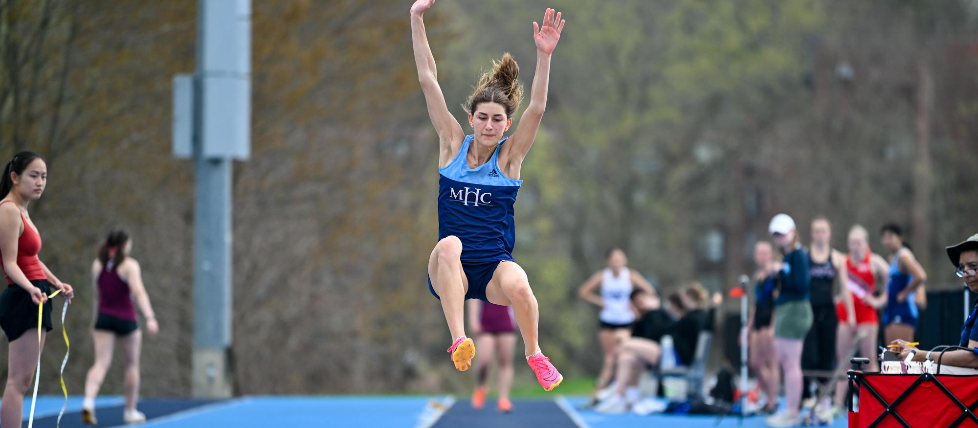 Ioanna Tsoni won the conference long jump title at 5.75 meters at the NEWMAC Track & Field Championships at Mount Holyoke on April 25, 2025. Tsoni broke her own team record in the event, as well as in the 100 hurdles, on the first day of the meet. (Bob Blanchard/RJB Sports)