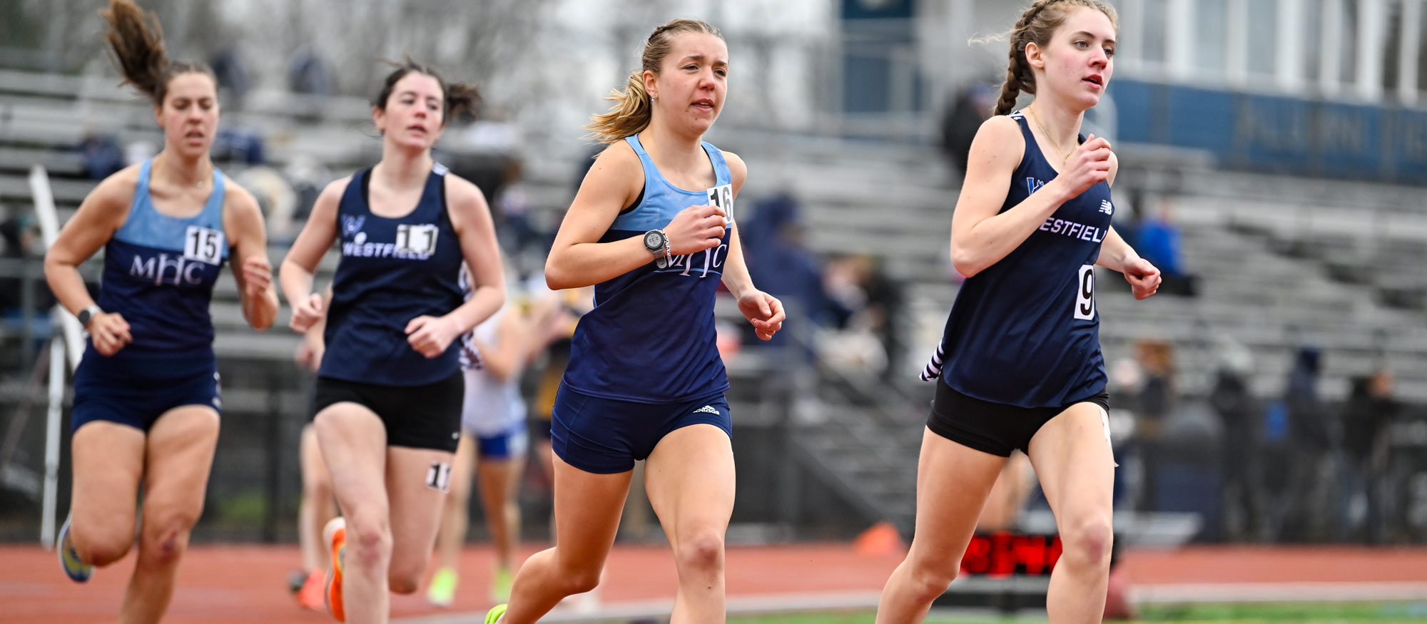 Sarah West (center) and Katie Earle (left) finished 10th and 11th, respectively, in the 10,000 meters at the New England Division III Outdoor Championships on May 1, 2026. (RJB Sports file photo)
