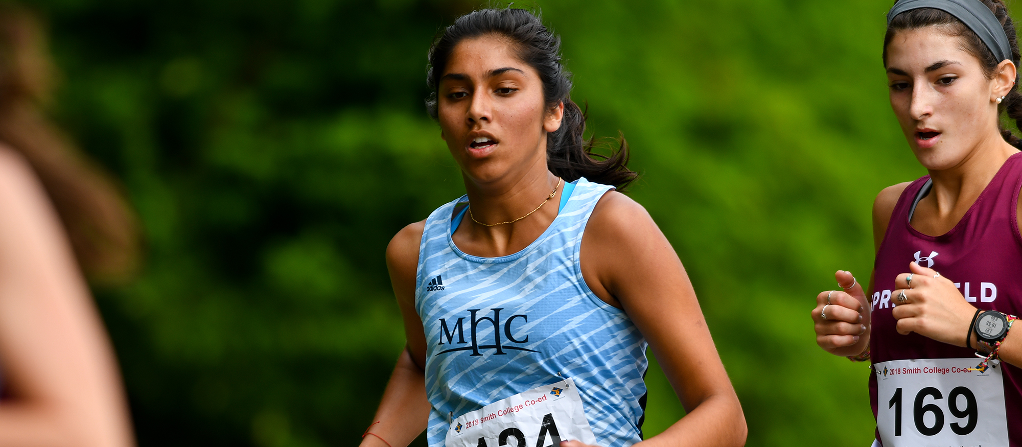 Action photo of Lyons cross country runner, Simone Jacob.