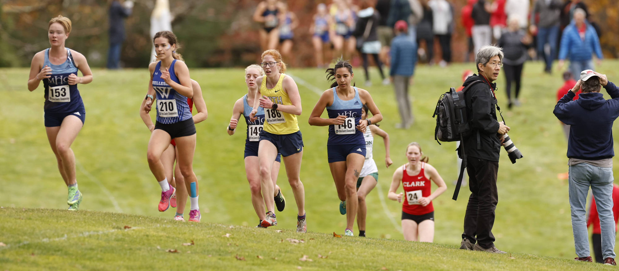 Tessa Lancaster, Elizabeth Gerbi and Kim Beaver led Mount Holyoke to fourth place among 12 teams at the NEWMAC Cross Country Championships on Nov. 2, 2024 in Wellesley, Mass. (Frank Poulin)